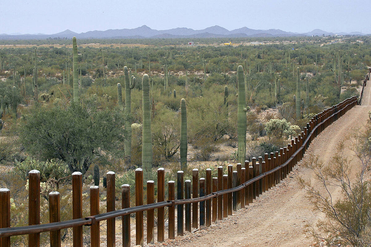 FILE - This Feb. 17, 2006 file photo shows the international border line made up of bollards: i ...