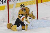 Golden Knights goaltender Logan Thompson (36) makes a save against St. Louis Blues during the s ...