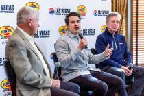 (LtoR) Chris Powell, president and general manager of the Las Vegas Motor Speedway listens to N ...