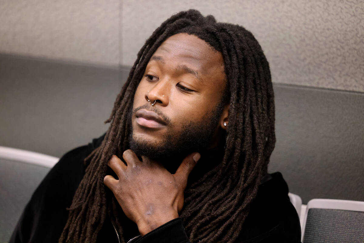 New Orleans Saints running back Alvin Kamara waits in court for arraignment at the Regional Jus ...