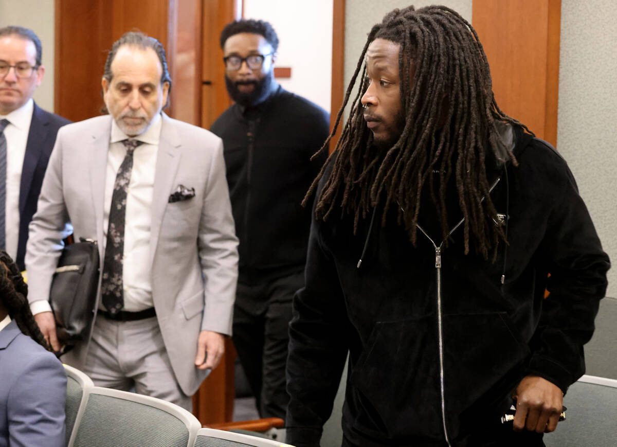 New Orleans Saints running back Alvin Kamara, right, arrives in court for arraignment at the Re ...