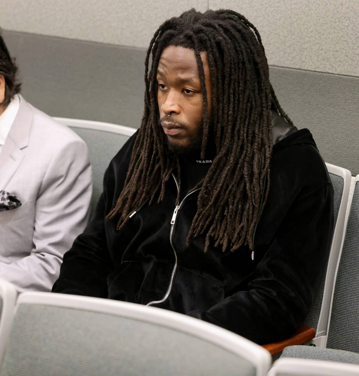 New Orleans Saints running back Alvin Kamara waits in court for arraignment at the Regional Jus ...