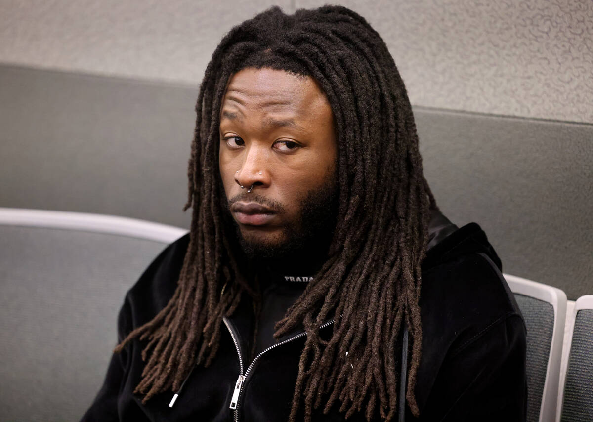 New Orleans Saints running back Alvin Kamara waits in court for arraignment at the Regional Jus ...