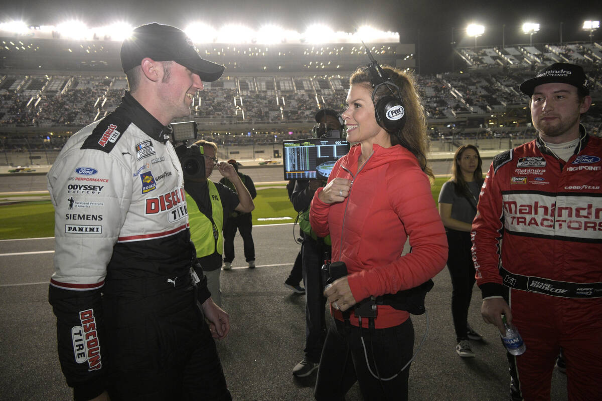 Austin Cindric, left, talks with Fox Sports reporter Jamie Little on pit road before the second ...