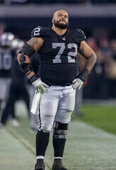Raiders offensive lineman Jermaine Eluemunor (72) looks to a replay as the against the San Fran ...