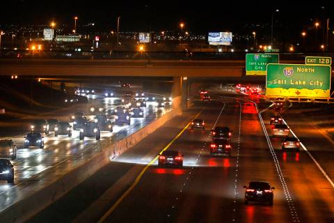 Exit signs to Interstate 15 are seen on the 215 Beltway, Thursday, March 2, 2023, in Las Vegas. ...