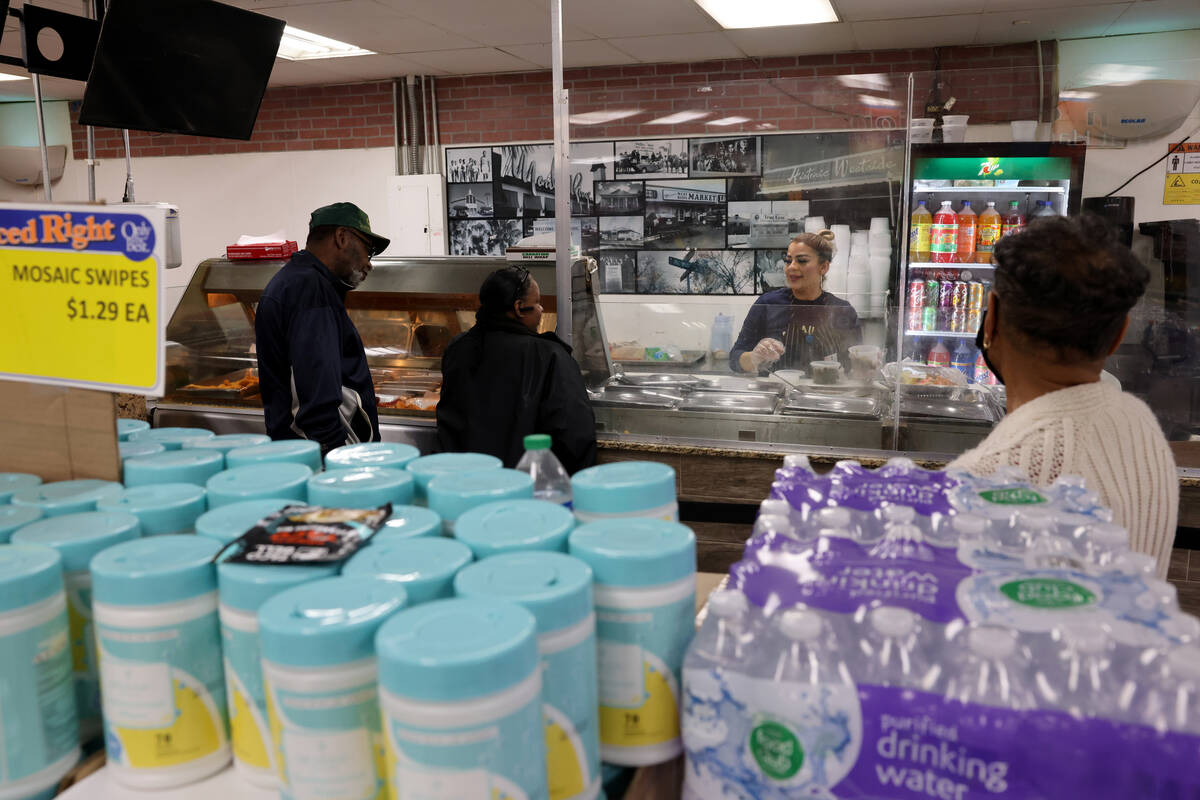Shoppers at Mario’s Westside Market Thursday, March 2, 2023. Owner Mario Berlanga is exp ...
