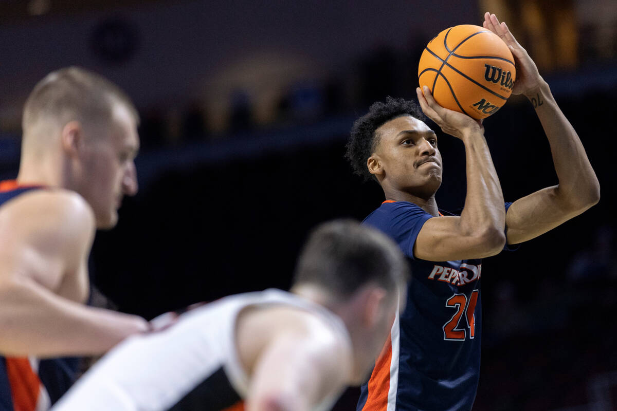 Pepperdine forward Maxwell Lewis (24), who is from Las Vegas, shoots a free throw during a West ...