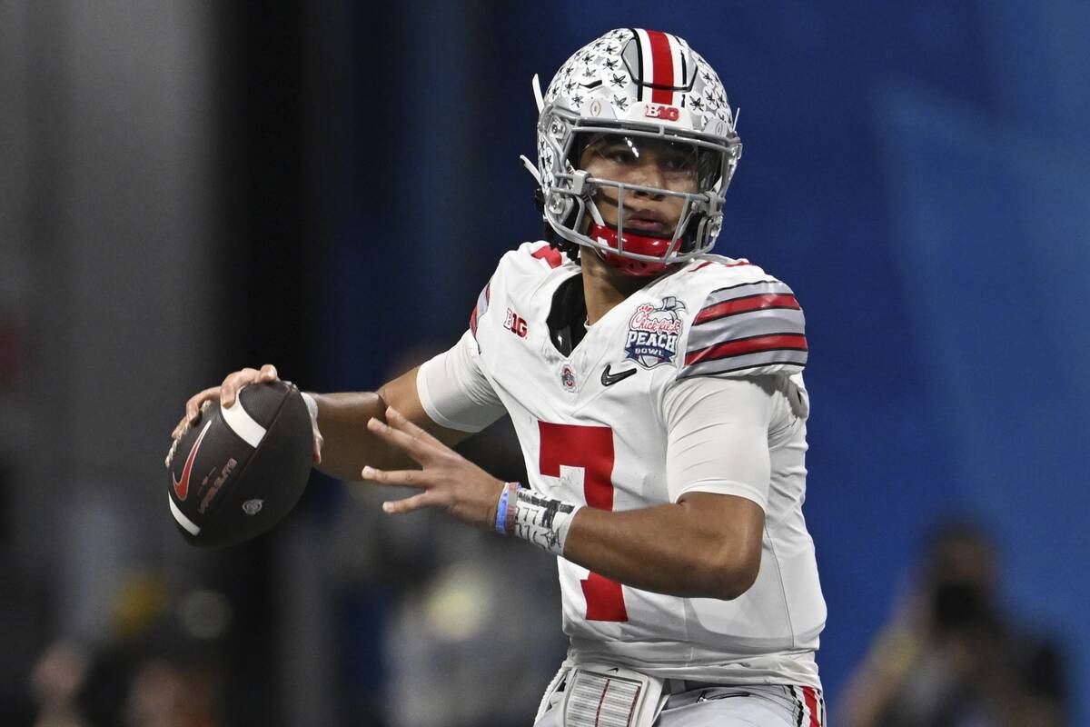 Ohio State quarterback C.J. Stroud (7) passes against Georgia during the first half of the Peac ...
