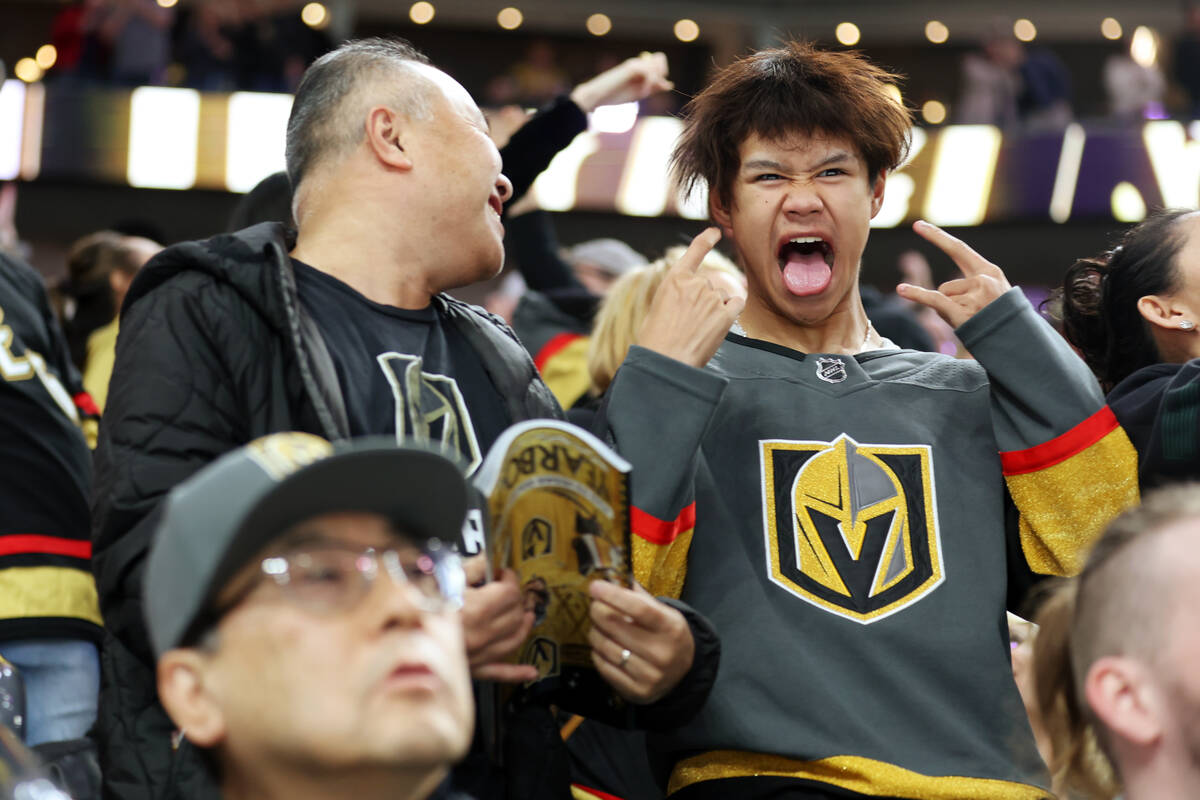 Fans cheer after a score by the Vegas Golden Knights against the New Jersey Devils during the s ...