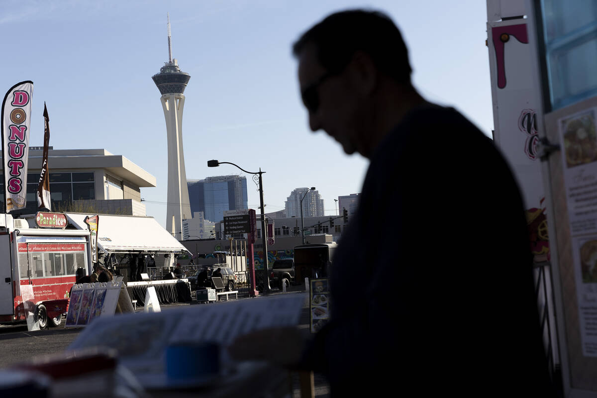 Jorge Morales, co-owner of QFS Tacos, sets up his food truck ahead of First Friday on Friday, M ...