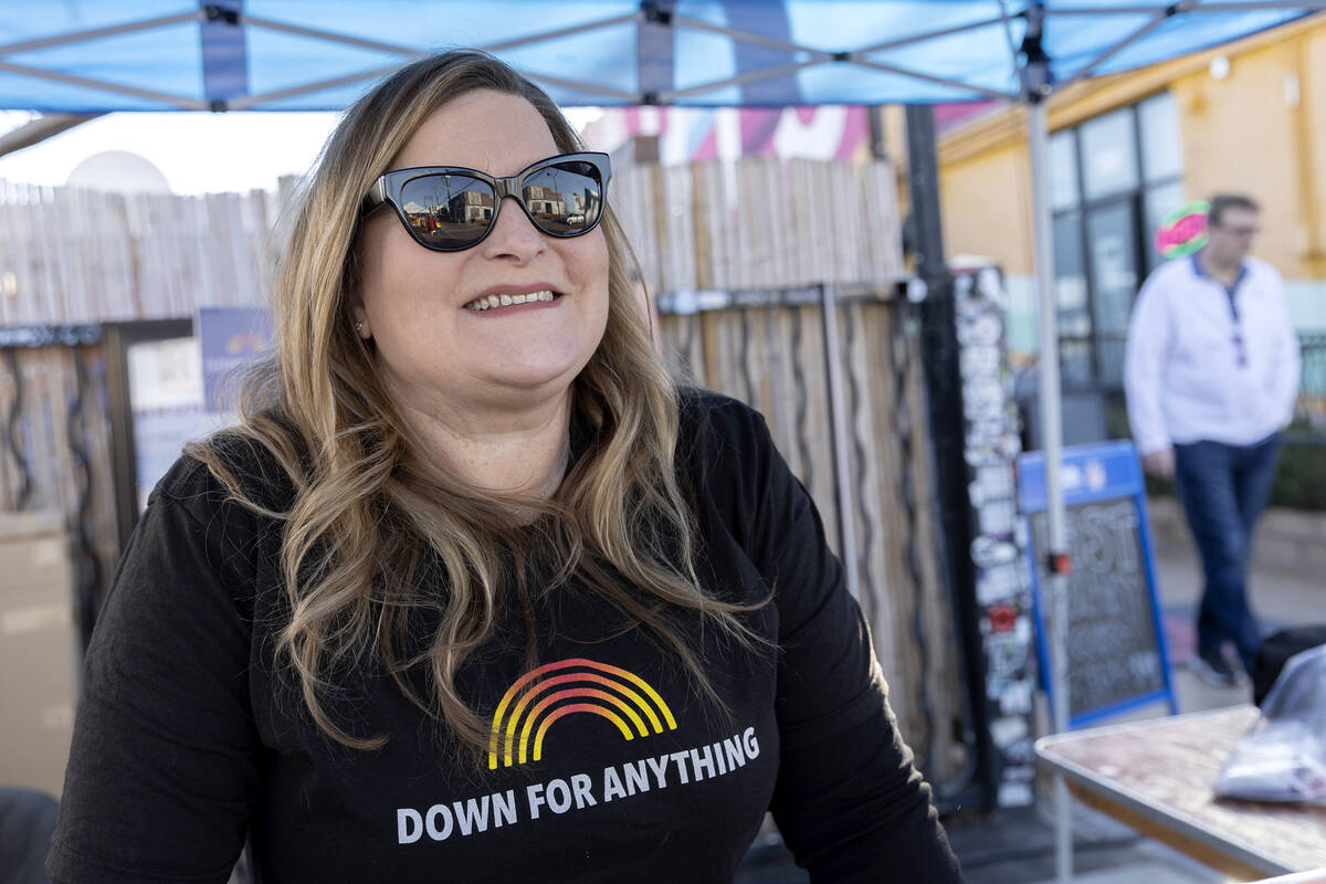 Downtown is reflected in Downtown Vegas Alliance executive director Carolyn Wheeler’s su ...