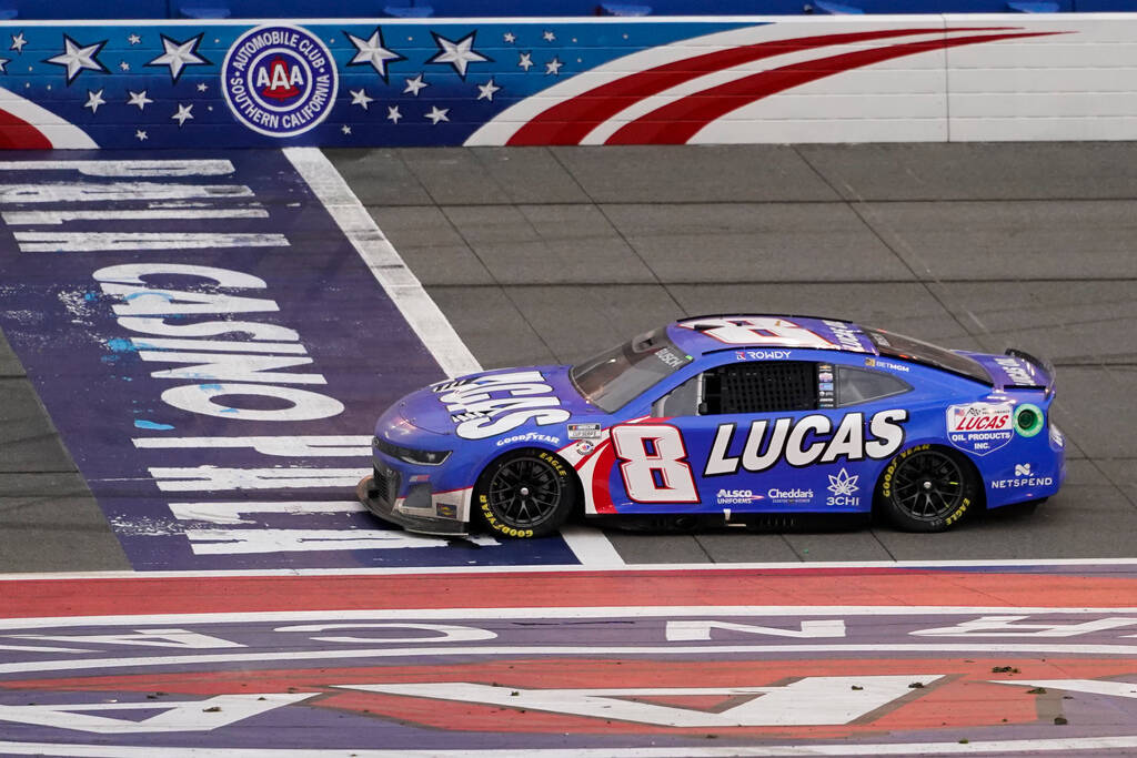 Kyle Busch (8) crosses the finish line to win a NASCAR Cup Series auto race at Auto Club Speedw ...