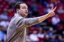 UNLV head coach Kevin Kruger signals his players against Utah State during the second half of t ...