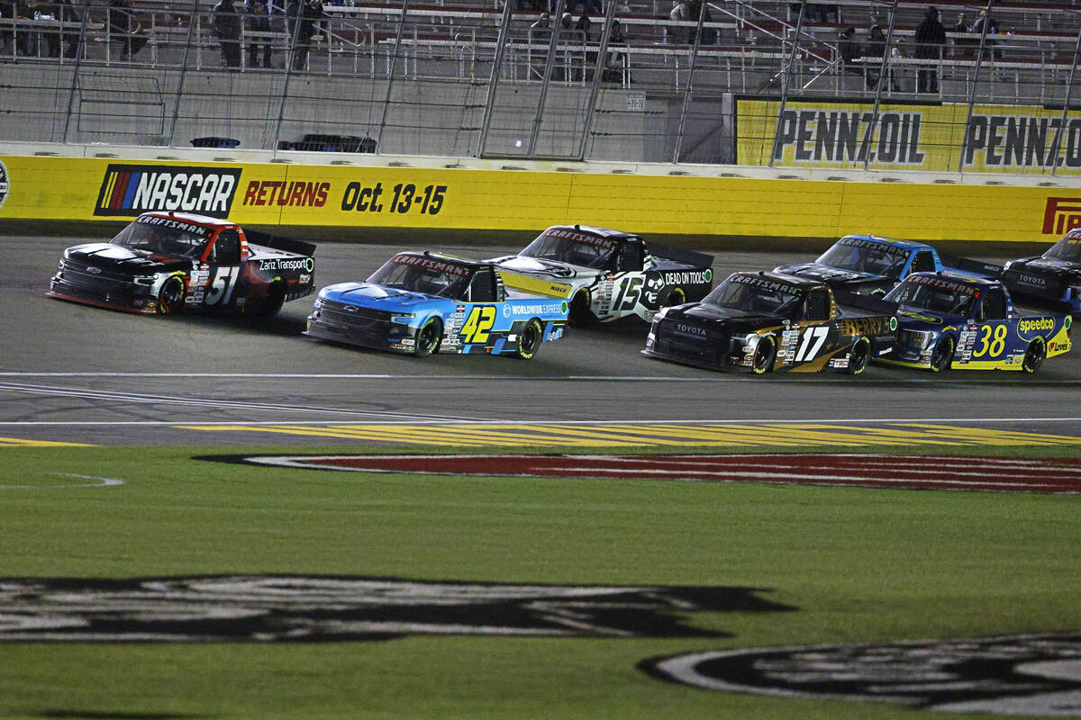 Kyle Busch (51) leads the pack during the NASCAR Craftsman Truck Series auto race at Las Vegas ...
