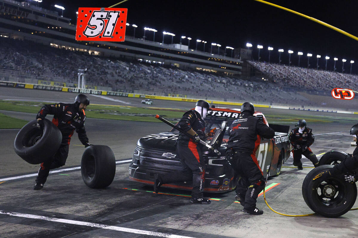 Kyle Busch (51) makes a pit stop during the NASCAR Craftsman Truck Series auto race at Las Vega ...