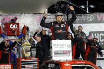 Kyle Busch (51), center, celebrates winning the Craftsman Truck Series at Las Vegas Motor Speed ...