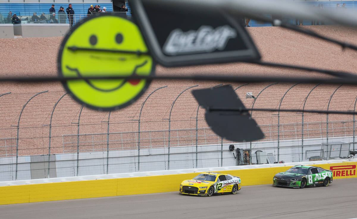 Driver Ryan Blaney (12) drives ahead of Kyle Busch (8) during the Pennzoil 400 NASCAR Cup Serie ...