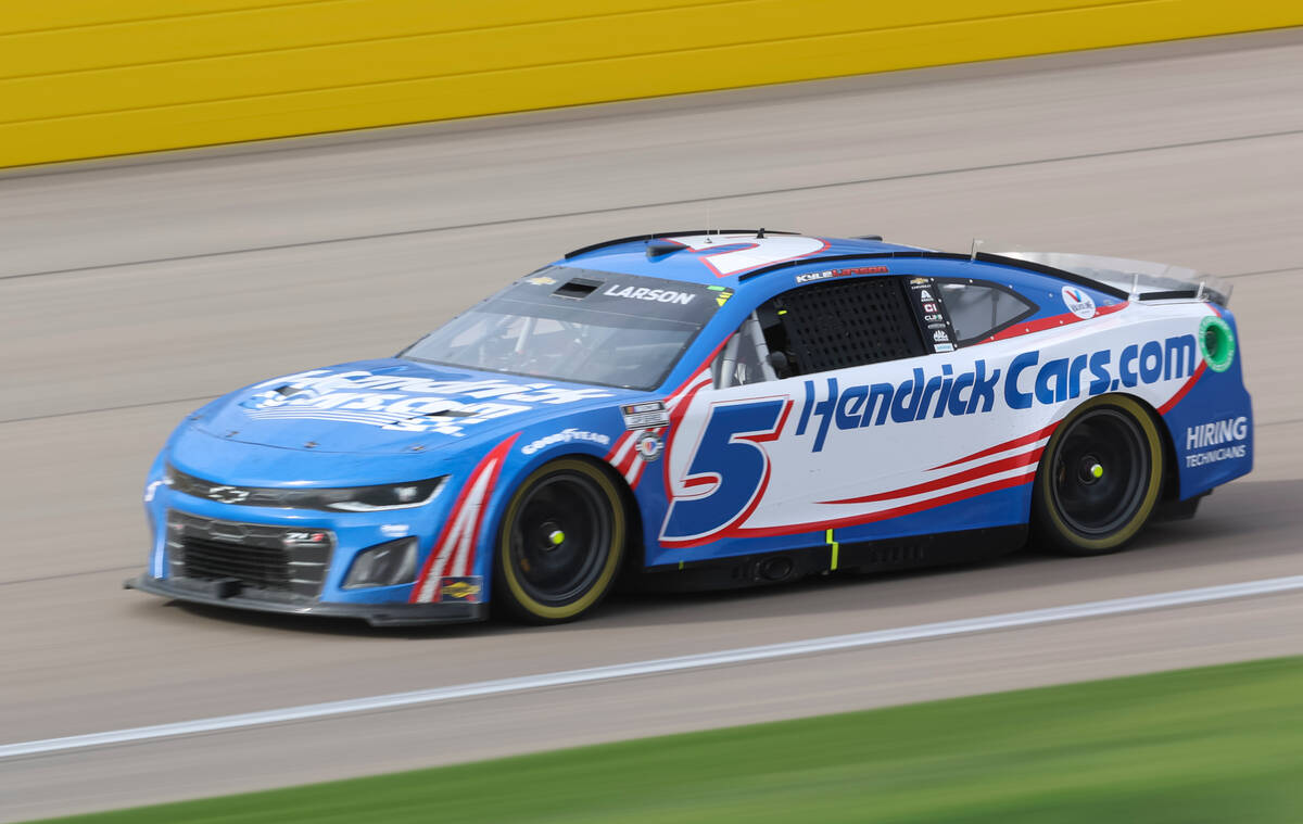 Driver Kyle Larson leads the field during the Pennzoil 400 NASCAR Cup Series race at Las Vegas ...