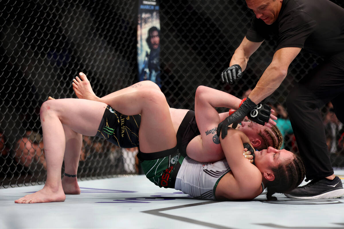 Alexa Grasso, bottom, submits Valentina Shevchenko in the fourth round of women's flyweight tit ...