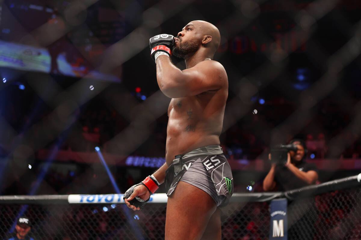 Jon Jones reacts after submitting Ciryl Gane in the first round of a heavyweight title bout dur ...