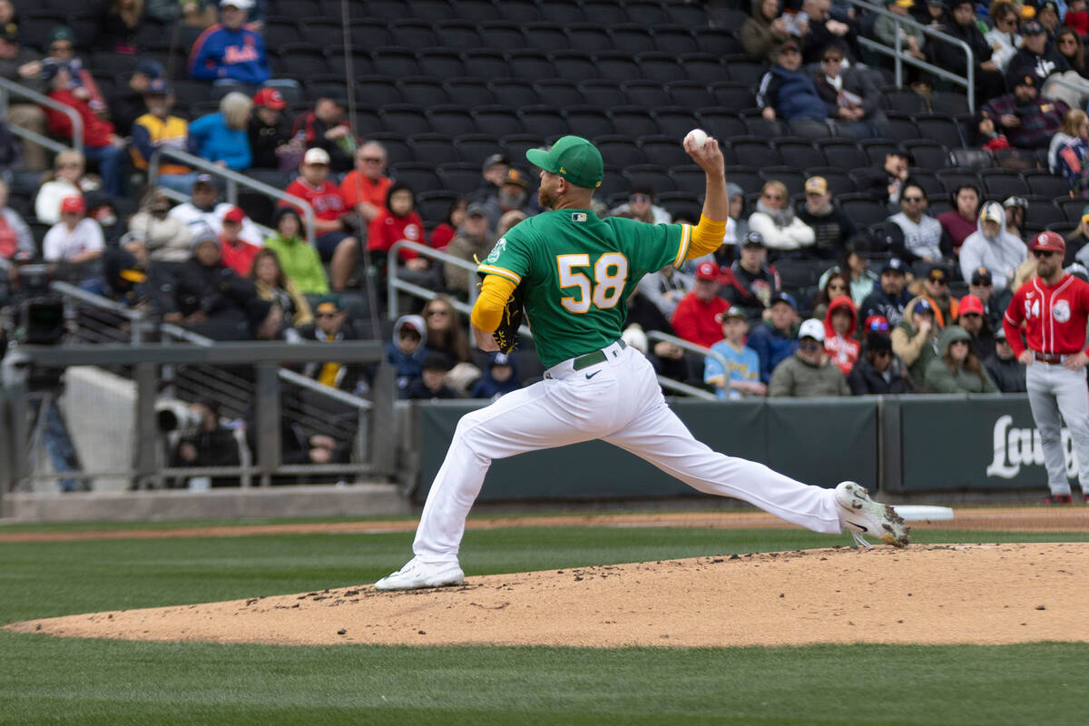 Oakland Athletics starting pitcher Paul Blackburn (58) throws a pitch during the first inning o ...