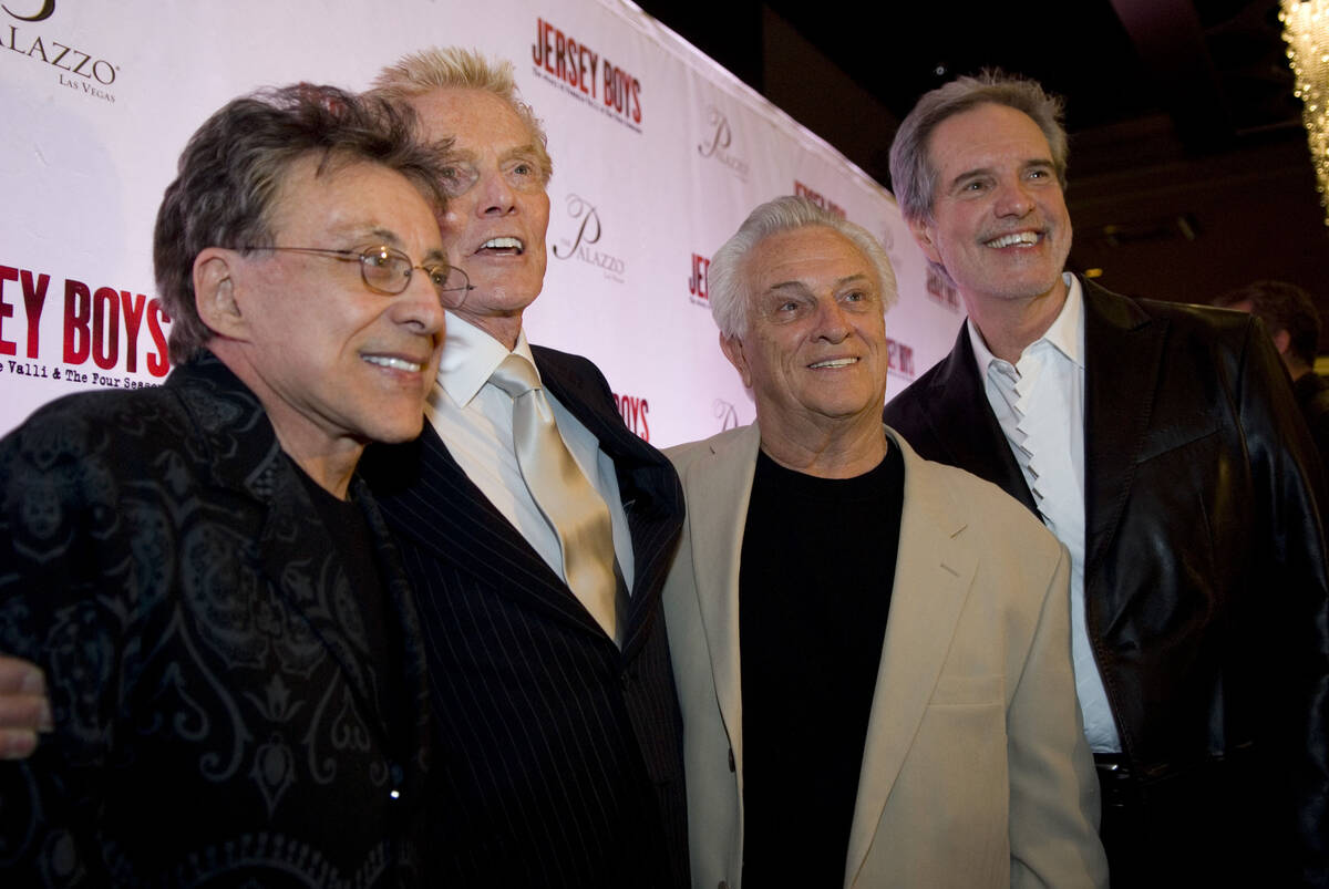 Four Seasons producer Bob Crewe, second from left, is flanked by original members of the singin ...