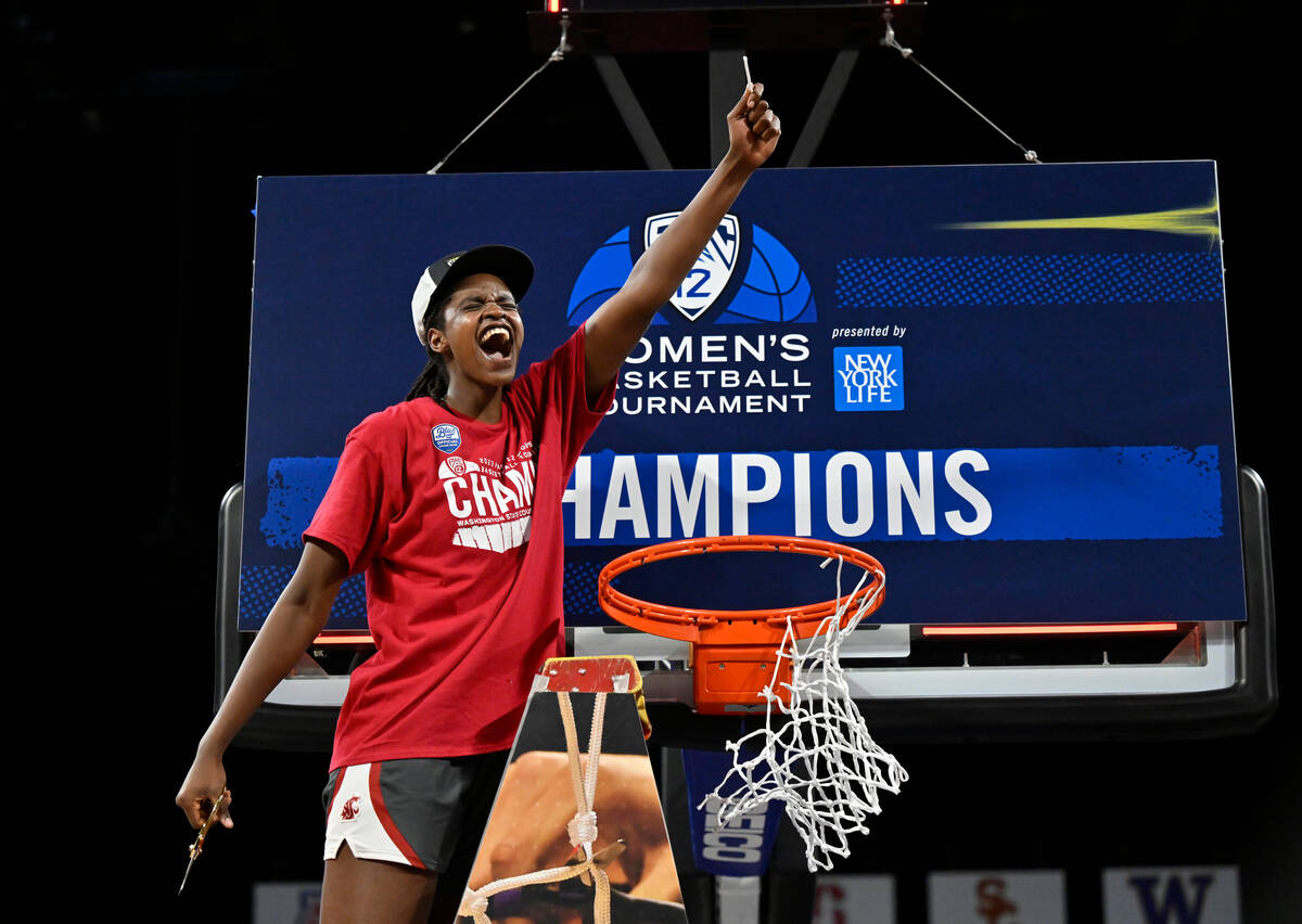 Washington State center Bella Murekatete celebrates after the team defeated UCLA in an NCAA col ...