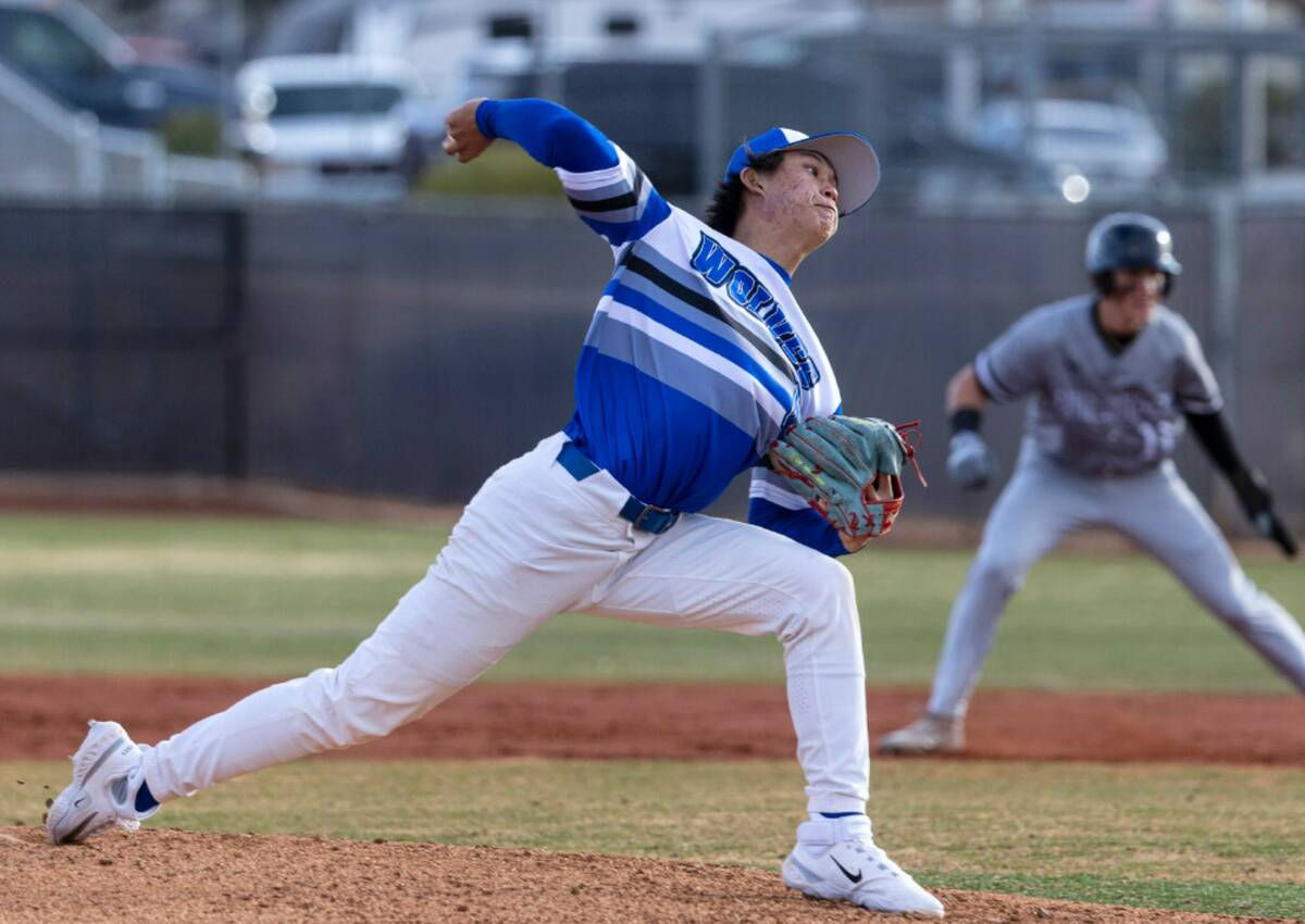 Basic High's Tee Southisene delivers against Faith Lutheran during their Class 5A baseball tour ...