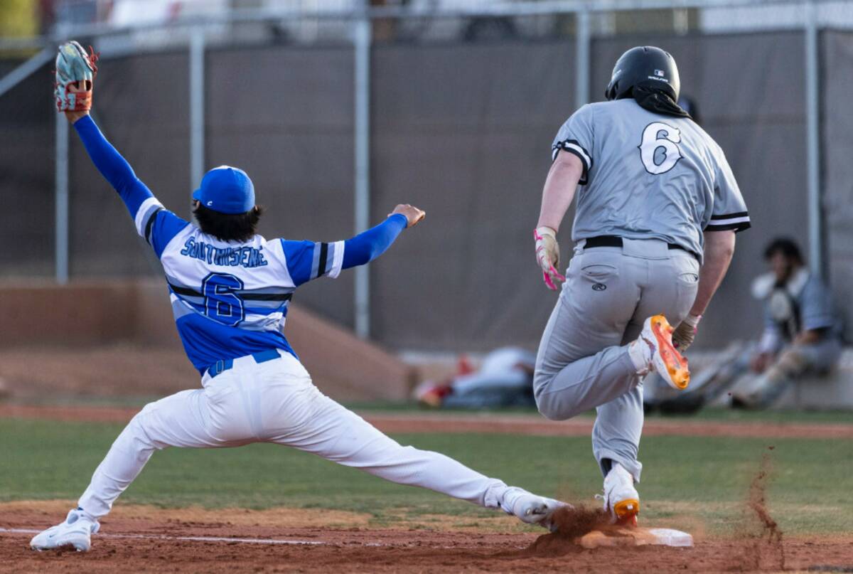Basic High's Tee Southisene is unable to force Faith Lutheran's Dylan Swanson out at first duri ...