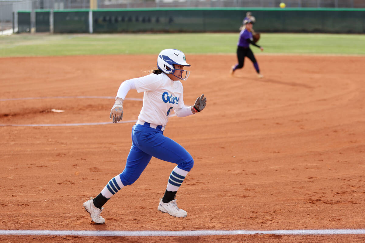 Green Valley's Kalina Carrizales (4) runs to first base after a hit during a softball game agai ...