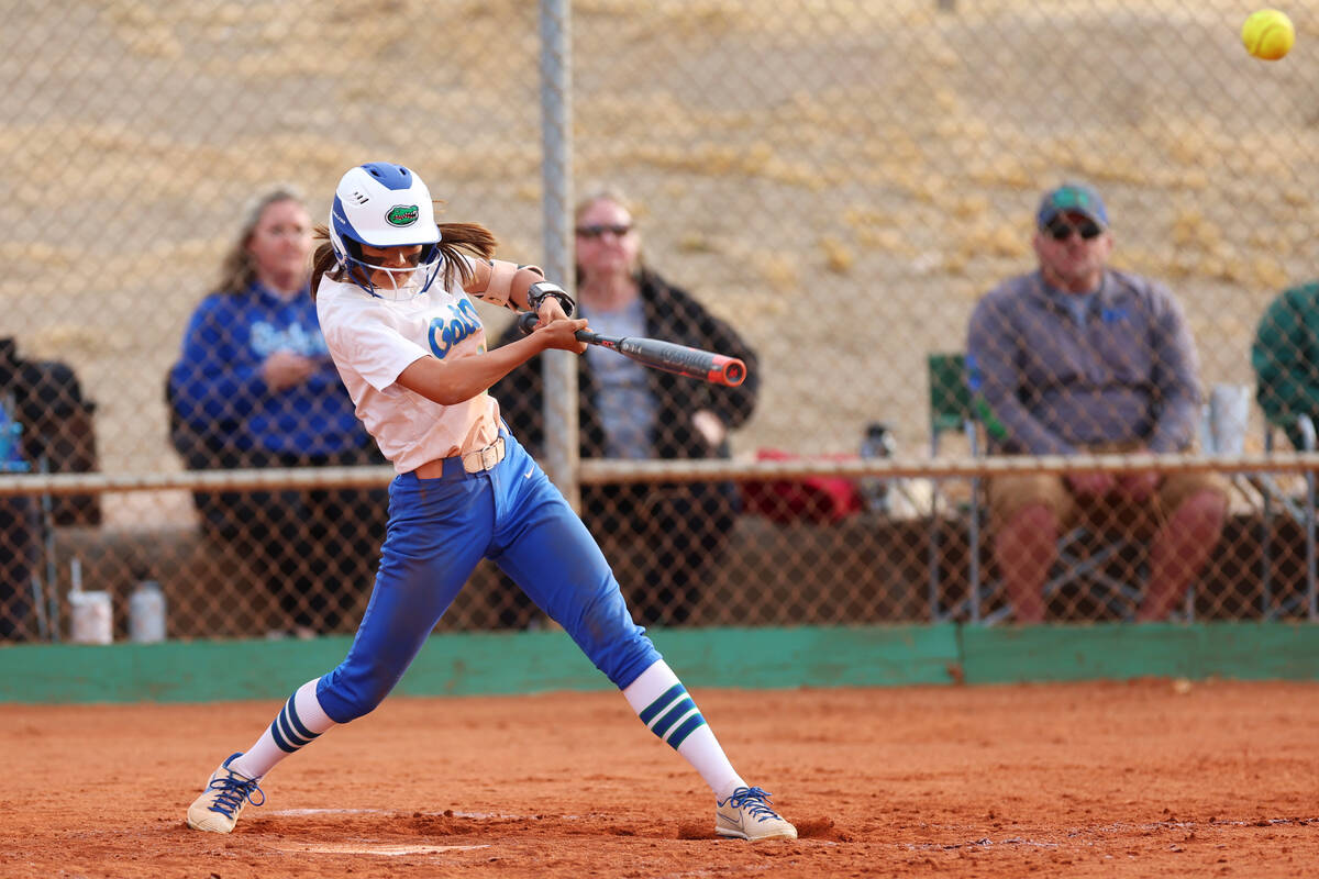 Green Valley's Gabby Machida (1) hits a triple during a softball game against Silverado at Gree ...