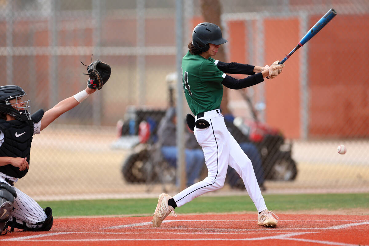 Palo Verde's Zane Helein (24) connects with the ball for a single during a baseball game agains ...
