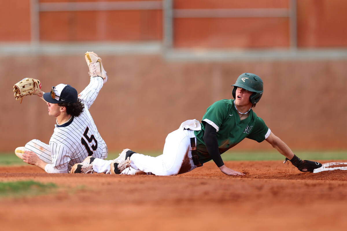 Palo Verde's Branson Pullan (23) slides safely to second base against Legacy's Colton Stanton ...