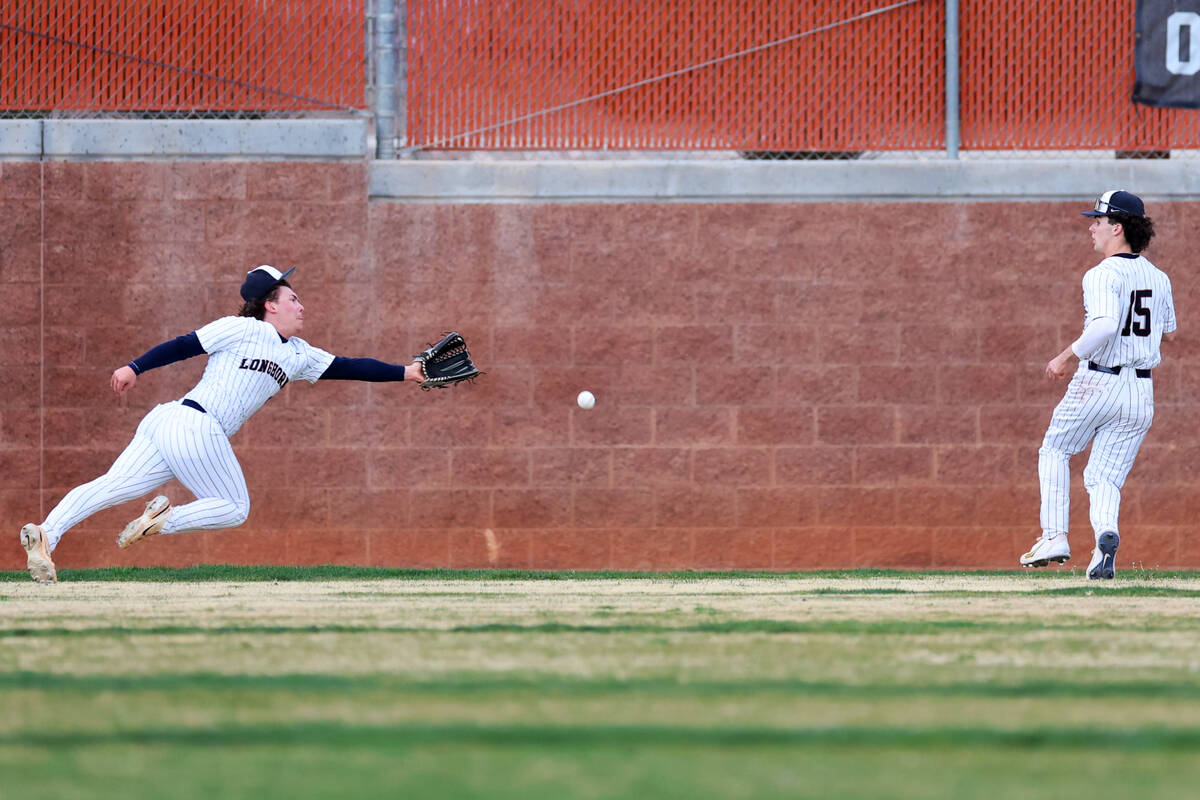 Legacy's Joshua Lamantia (9) fails to make a catch in the left outfield as his teammate Colton ...