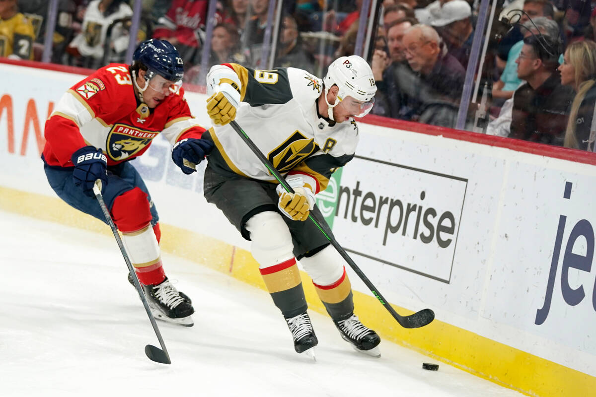 Vegas Golden Knights right wing Reilly Smith (19) and Florida Panthers center Carter Verhaeghe ...