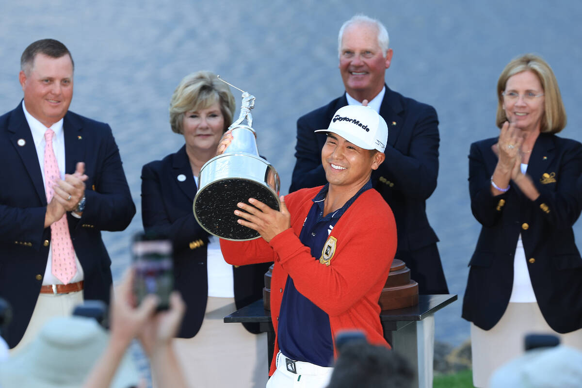 Kurt Kitayama of the United States celebrates with the trophy after winning during the final ro ...