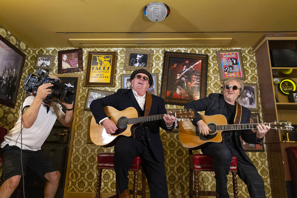 The Black Donnellys, a local Irish music duo, play a song at Irish pub Ri Ra at The Shoppes at ...