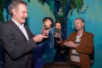 Bryan Cranston and Aaron Paul are shown with their shrunken head at The Golden Tiki on Friday, ...