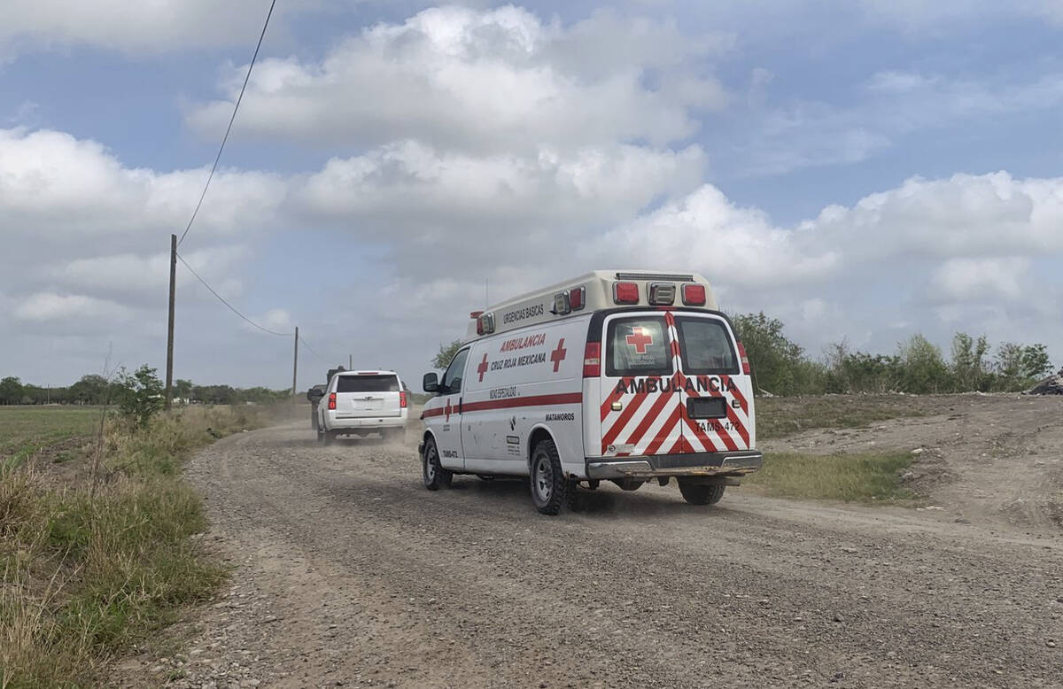 A Mexican Red Cross ambulance transports two Americans found alive after their abduction in Mex ...