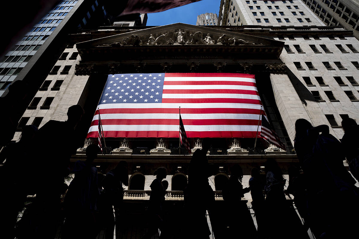 Stocks sank on Wall Street after the head of the Federal Reserve warned it could speed up its e ...