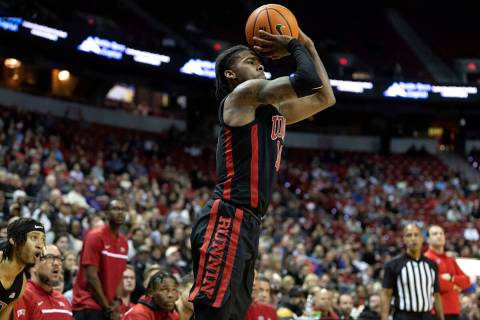 UNLV Rebels guard Keshon Gilbert (10) shoots a three-pointer from the corner during the second ...