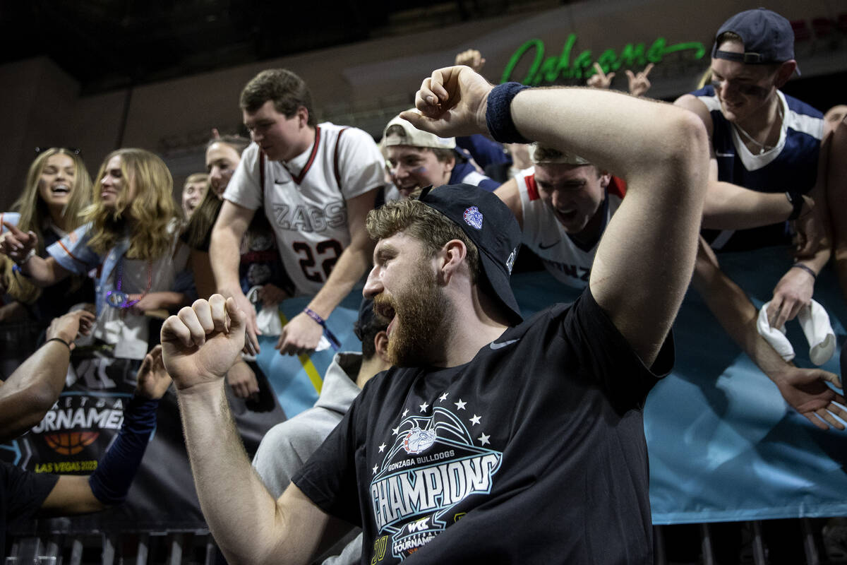 Gonzaga Bulldogs forward Drew Timme celebrates with fans after his team won a West Coast Confer ...