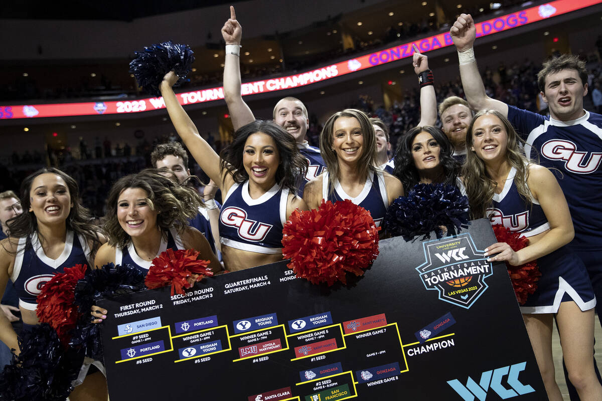Gonzaga Bulldogs cheerleaders celebrate after their team won a West Coast Conference men&#x2019 ...