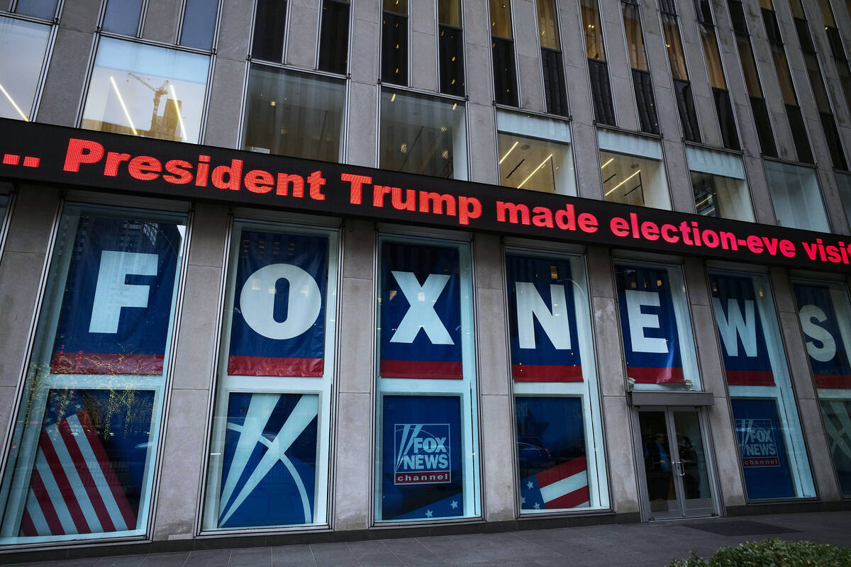FILE - A headline about President Donald Trump is displayed outside Fox News studios in New Yor ...