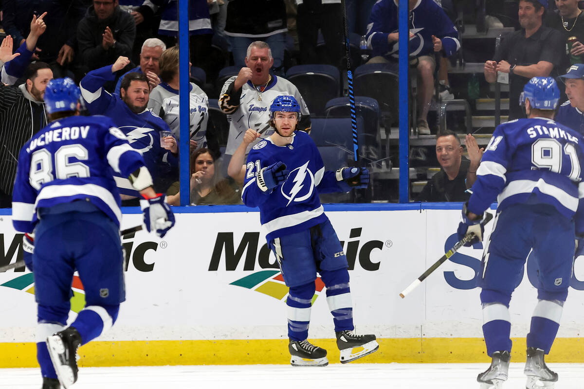 Tampa Bay Lightning's Brayden Point (21) celebrates after his goal against the Vegas Golden Kni ...
