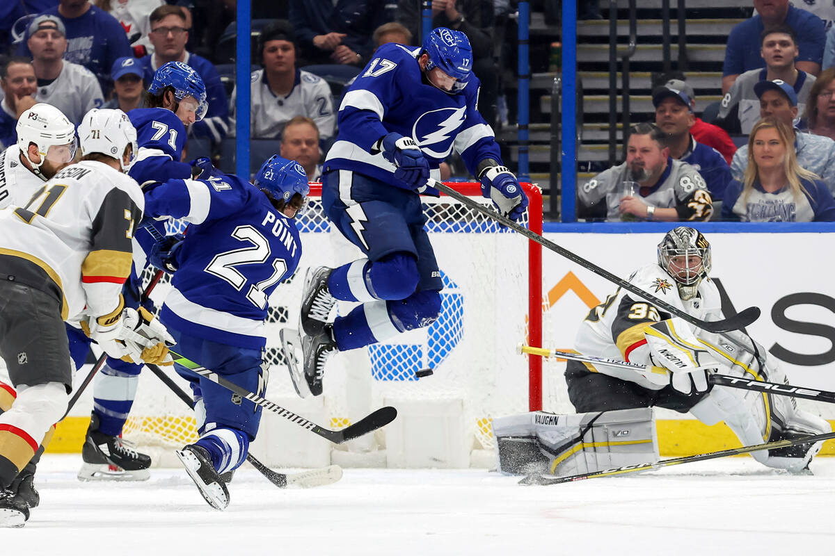 Tampa Bay Lightning's Brayden Point (21) scores past Vegas Golden Knights goaltender Jonathan Q ...