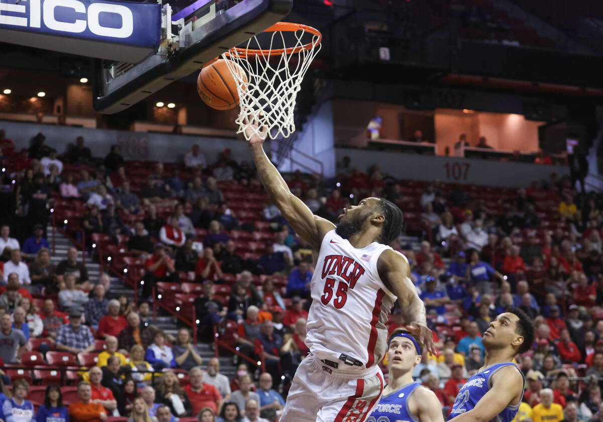 UNLV guard EJ Harkless (55) lays up the ball against Air Force during the second half of a bask ...