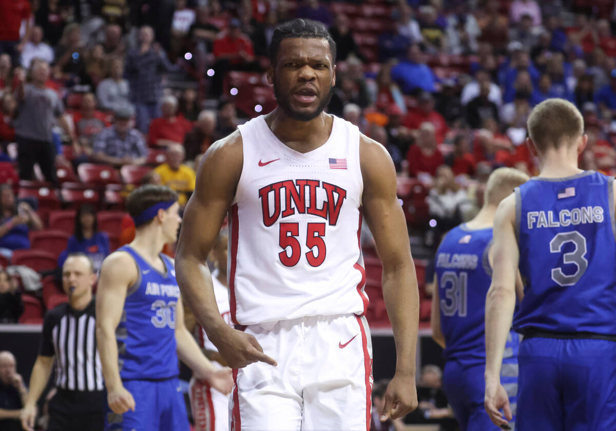 UNLV guard EJ Harkless (55) reacts after scoring and drawing a foul against Air Force during ov ...