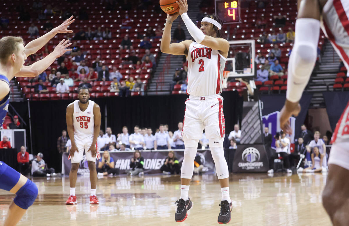 UNLV guard Justin Webster (2) shoots against Air Force during overtime in a basketball game in ...